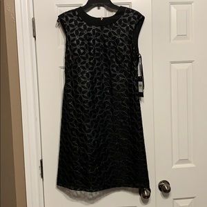 Black dress with “leather” feel black lace overlay